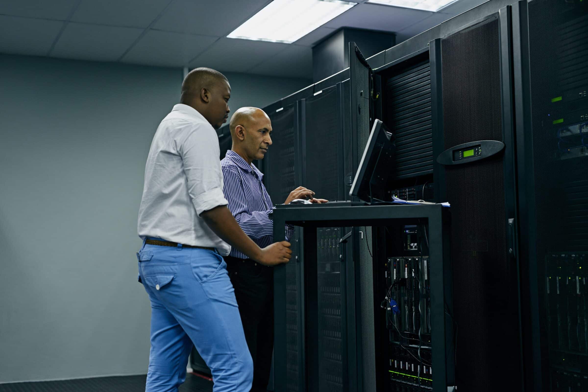 Cloud technicians working in a server room